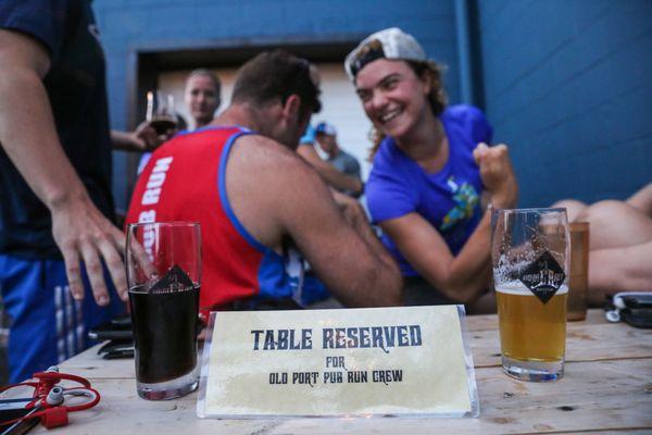 Drinking Liquid Riot's delicious craft beer in our reserved deck space after the run. Cheers!