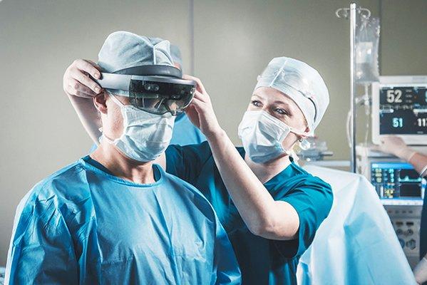 Surgeon wearing Novarad's VisAR augmented reality surgical navigation