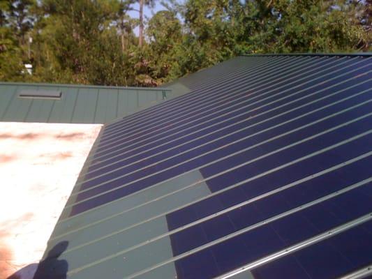 Metal roof with thin film solar system.