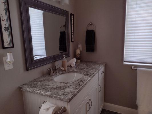 Master bath beautiful granite countertops with plenty of space to enjoy