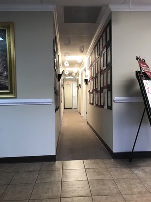 Multiple patient rooms down hallway