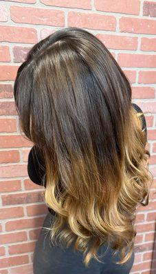 Gorgeous warm tones balayage/ombre color. Schwarzkopf lightener and biscuit toner. Conditioning mask, haircut with layers, and curls.