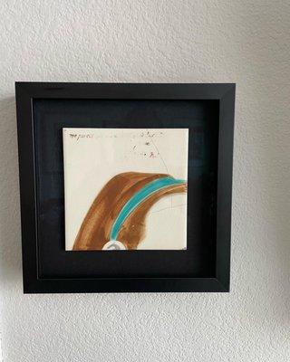 A tile from the Olympic Pool in San Juan, Puerto Rico by Lorenzo Homar. Framed by MitreBox.