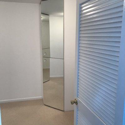 Walk in closet walls repaired and finished. Doors finished in Oil.