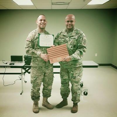 SSG Mercado receiving an award