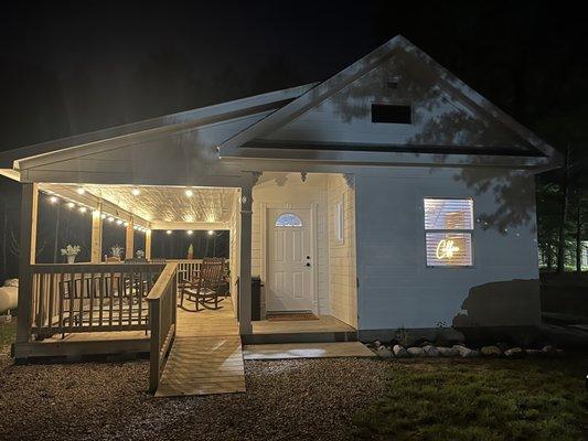 Exterior of Coffee House with amazing covered porch and plenty of rockers.