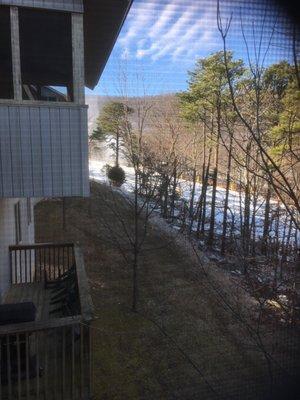 View of snowmaking machines from outside on the terrace.