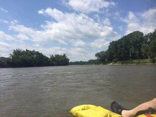 River doesn't look clear or very inviting, but it is clean and for the most part shallow enough where you can stand