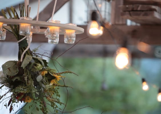 This unique floral chandelier creates the perfect centerpiece to accentuate your wedding.