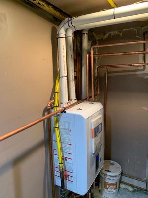 Navien Tankless Heat/Water Heater Combi System Installation.