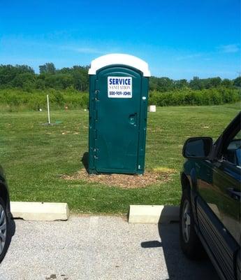 A modern and very clean port-a-potty is provided.