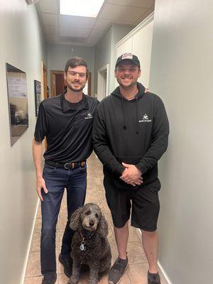 John, Dylan and the standard poodle mascot for Wright Auto Works