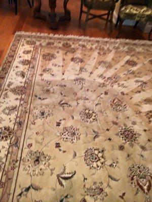 Half cleaned wool area rug