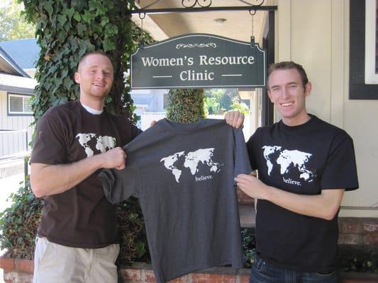 Women's Resource Clinic receives the charcoal "believe shirt" to represent their service.