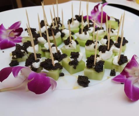 Appetizer with black caviar