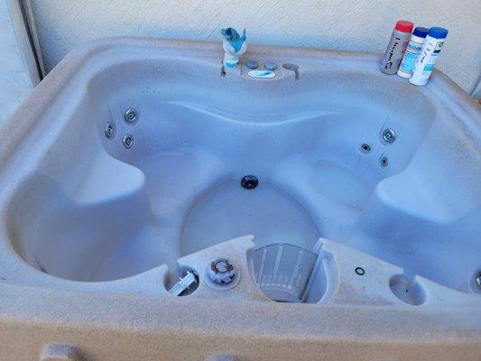 Chemical damaged hot tub by chemicals sold by Sun Devil Pool and Supply.