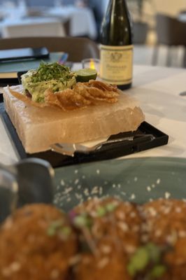 Ahi tuna tartare on a salt block