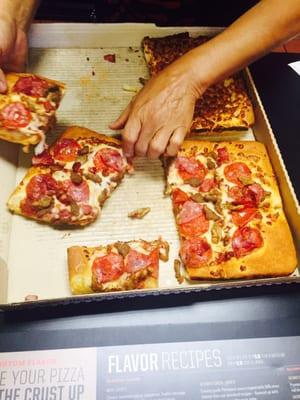 Manager treating my pizza like a puzzle