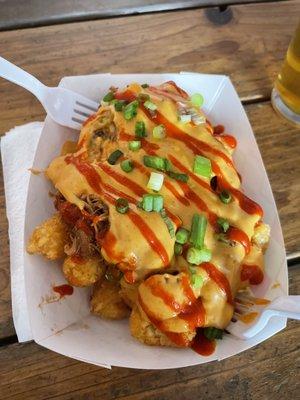 Nacho tots with pulled pork and beer cheese