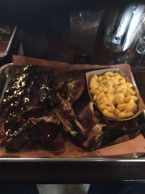 "The Feast" 1/2 rack of ribs, smoked chicken and smoked macaroni and cheese. The best ribs ever!! And their sauces are phenomenal!