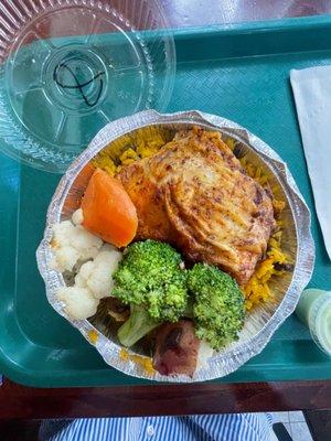 Rotisserie chicken, rice, and steamed vegetables