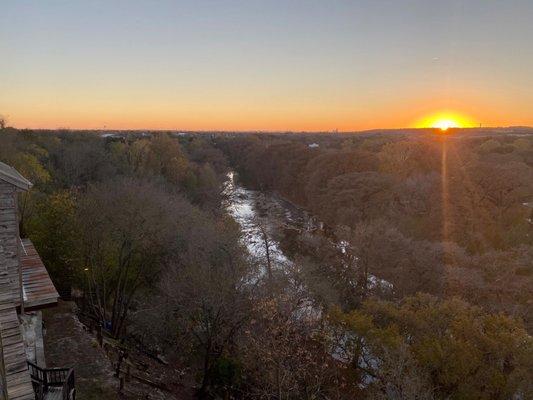 View of the river and sunset from our private balcony