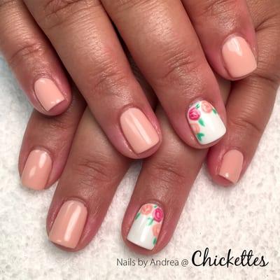 Gel polish manicure with hand painted flowers