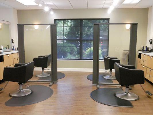 Hair salon with safety partitions