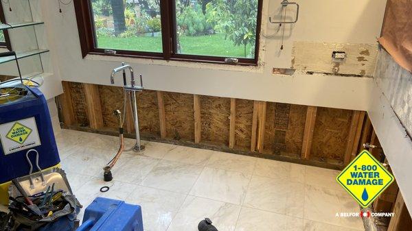 Removal of water damaged drywall in master bathroom