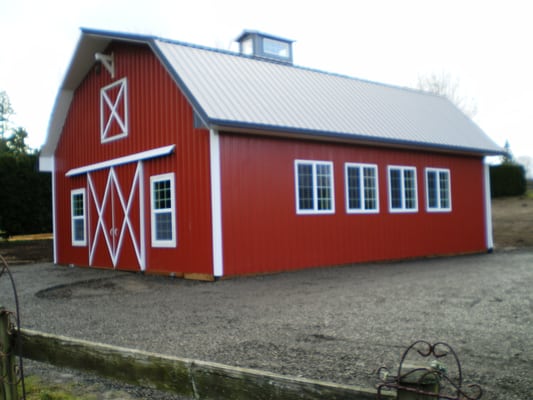 Nice Gambrel style barn with plenty of windows for natural light.