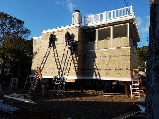 New exterior remodel in Bethany beach delaware being wrapped with definable house wrap.