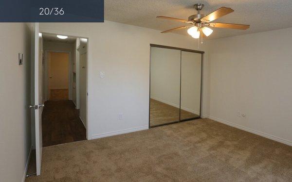 Mirrored closet doors and new carpet.