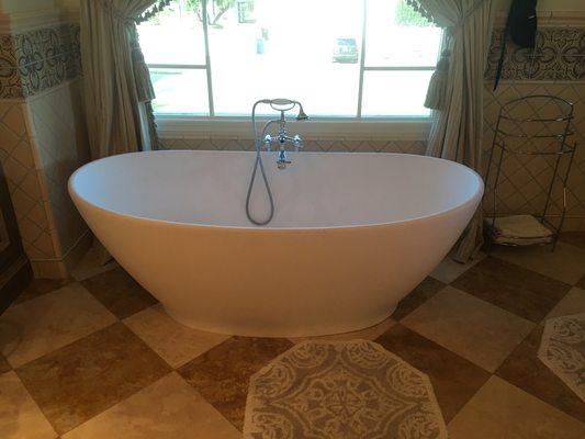 Beautiful Limestone Stand alone soaker tub with floor mounted faucet (Complete)