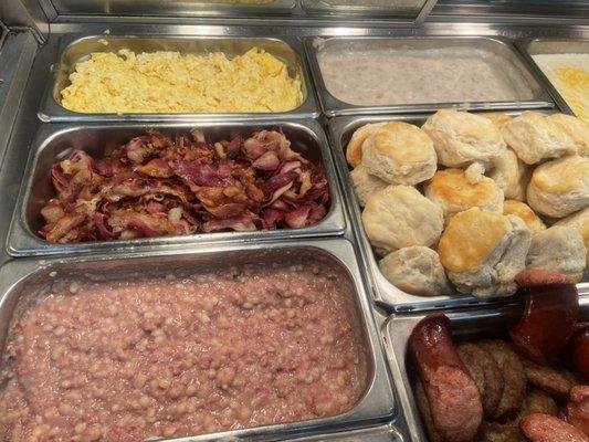 Eggs, bacon, corn beef hash, gravy, biscuits and sausage