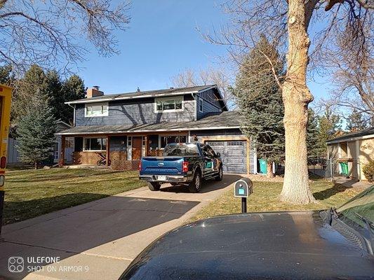 new siding, paint, stained beams  and gutters