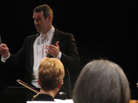 Maestro Travis Hatton, Music Director