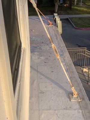 Shattered glass on top of the leasing office where people walk below (been on there since the day i moved in)