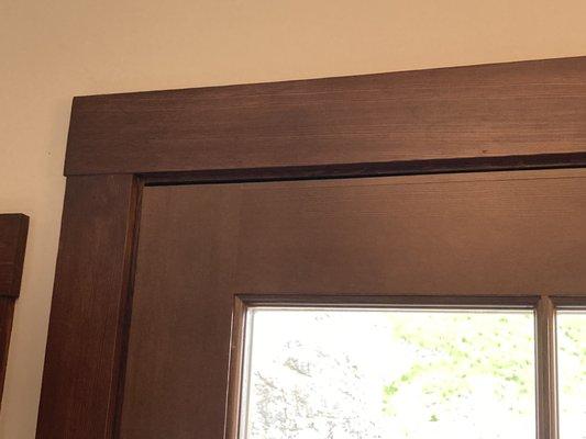 Exact same exterior door in a different location bowing out over a half inch provided by builders millwork supply.