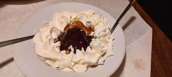 Pecan ball with carmel/ fudge sauce