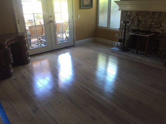 Wood floor cleaning and sealing results in a beautiful shine and a fresh start to your wood floors