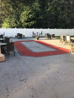 Amazingly designed patio for birthday parties, relaxing outside, playing corn hole, etc.