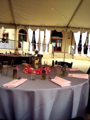 The outdoor courtyard was covered with a tent for this lovely wedding reception at Hamilton Twelve.