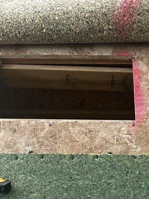 Subfloor hole repair.