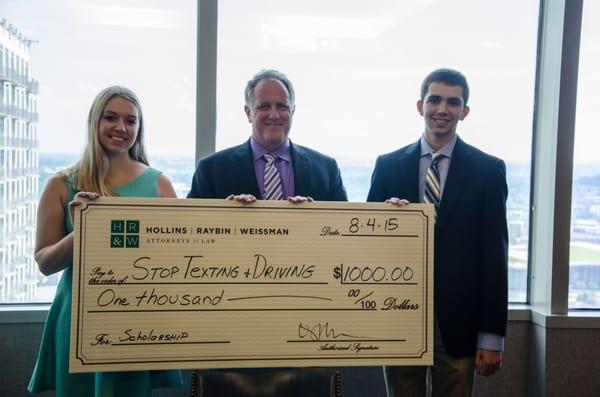 Attorney David Weissman (center) presenting to the winners of the 2015 Stop Texting and Driving Scholarship contest.