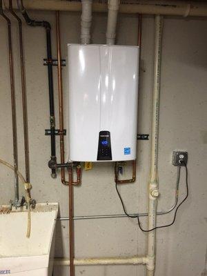 Installation of new tankless water heater! Our Customers after one month of use - absolutely Rave about it.