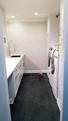 Modern laundry with Brazilian Slate floor