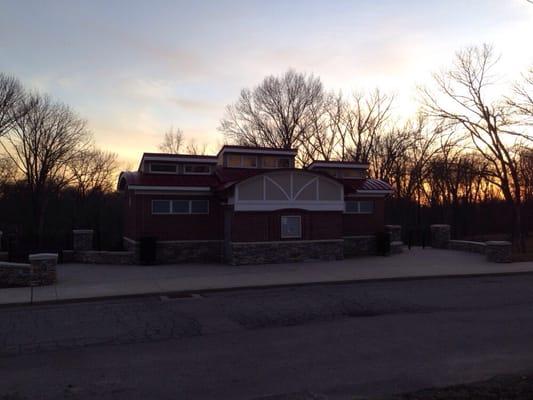 Restrooms across from playground.