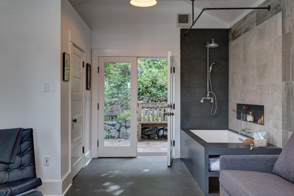 This amazing studio space in Queen Anne now has a long list of visitors for these homeowners who love to entertain and escape too.