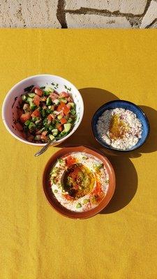 Israeli salad with fresh made hummus and babaganoush spiced to perfection!