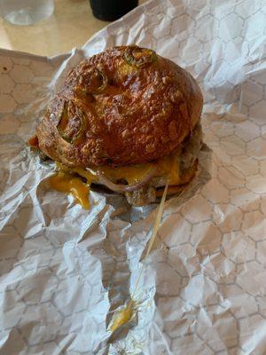 Jalapeno Cheddar bagel, toasted, with homemade sausage, cheddar cheese, and onion. THE BEST!